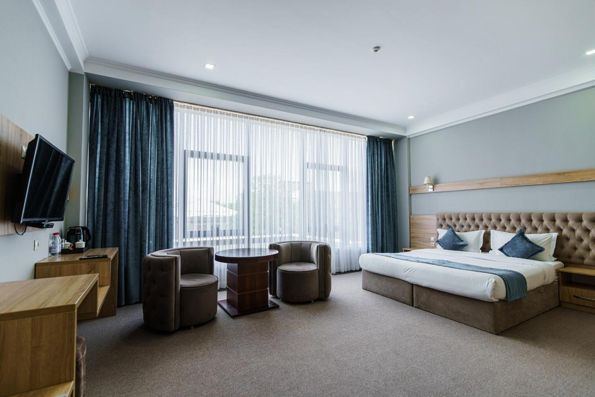 Park Hotel Al Bustan Шимкент Екстер'єр фото